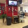 In a black barbershop and they got NASCAR on w/ the surround sound lol