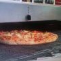 I've always heard that people get "excited" watching webcams. They are right. Domino's has a pizza making webcam.