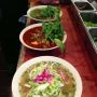 Beautiful caldos on the line in Xoco: smoked chicken pozole, red chile shortrib, green chile carnitas