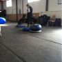 Another handler w/ her (adorable) pup on some of the balance/core strengthening equipment. 