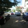 Все тротуары заставлены, как всегда.